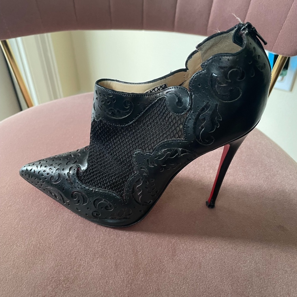 Christian Louboutin leather laced bootie with pointer toe
